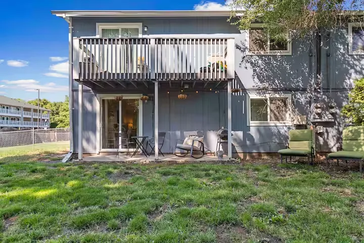 Backyard and upper deck of the home